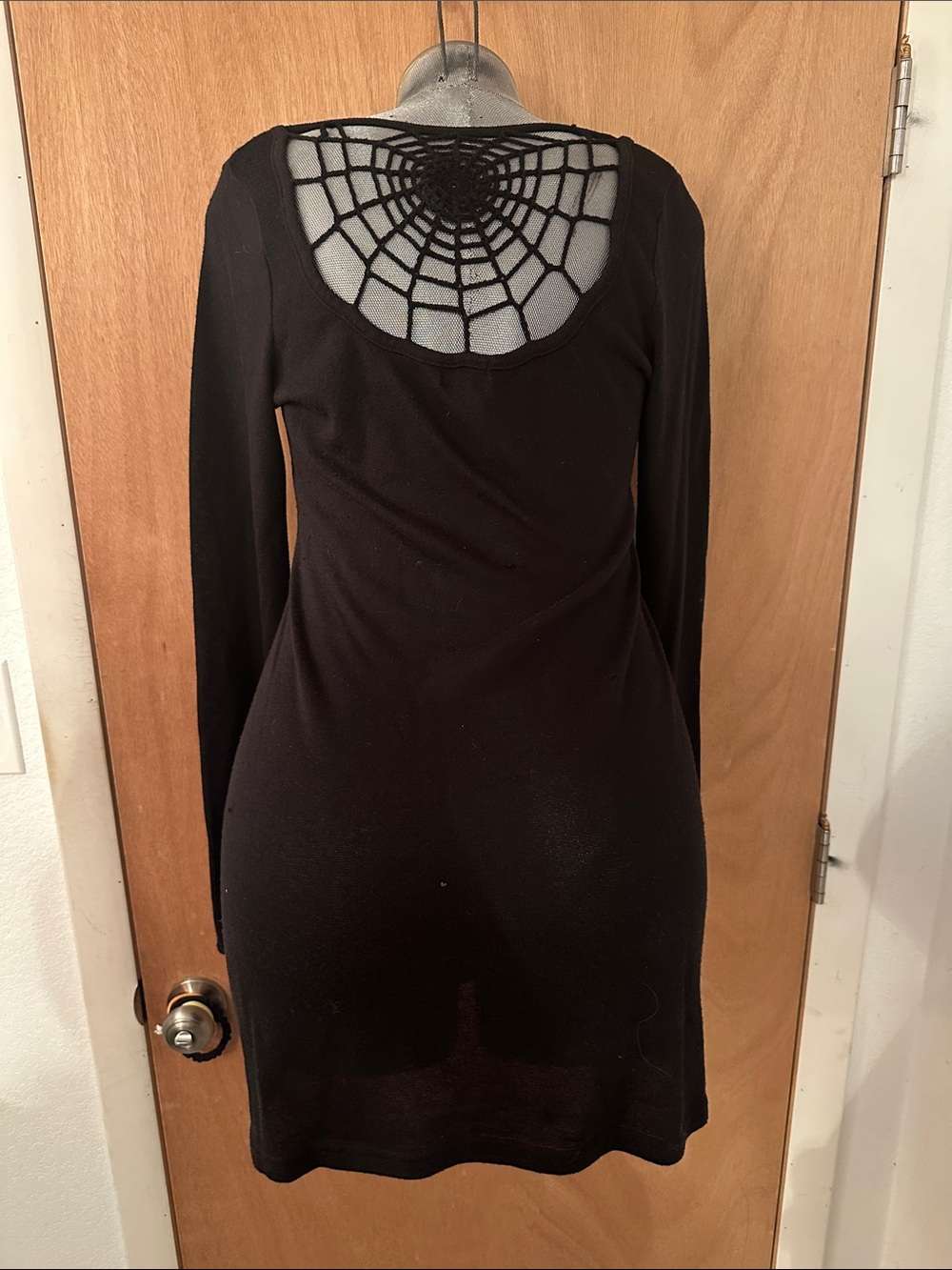 Black Long-Sleeve Mini Dress with Decorative Web Back
